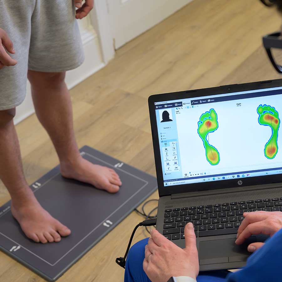 SO Podiatry - 2729 - Standing Posture Check With Footscan On Computer Display